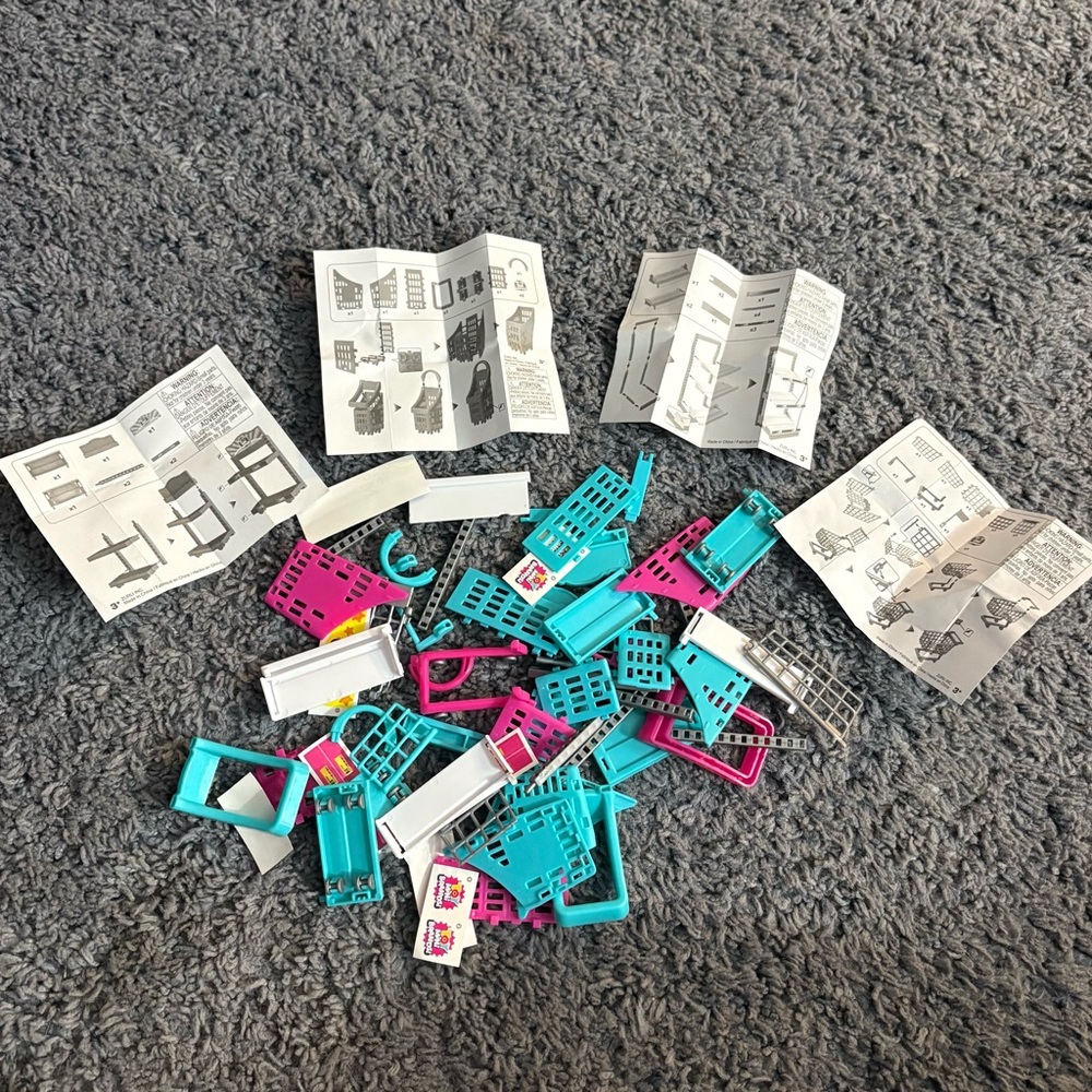 NWT Mini Brands pieces for a shopping cart, carrying case, shelves, and a stand